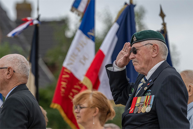 Kalbar RSL Sub Branch member Tony Young salutes during a ceremony at the Pheasant Wood Military Cemetery in Fromelles, France on 19 July 2025.