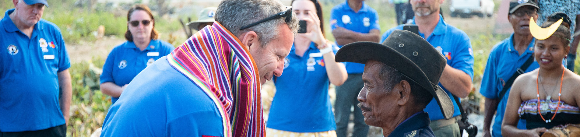 Timor Awakening event, elder giving scarf to RSL Veteran