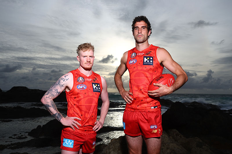 SUNS forward Ben King and defender John Noble in the Gold Coast SUNS 2025 ANZAC guernsey