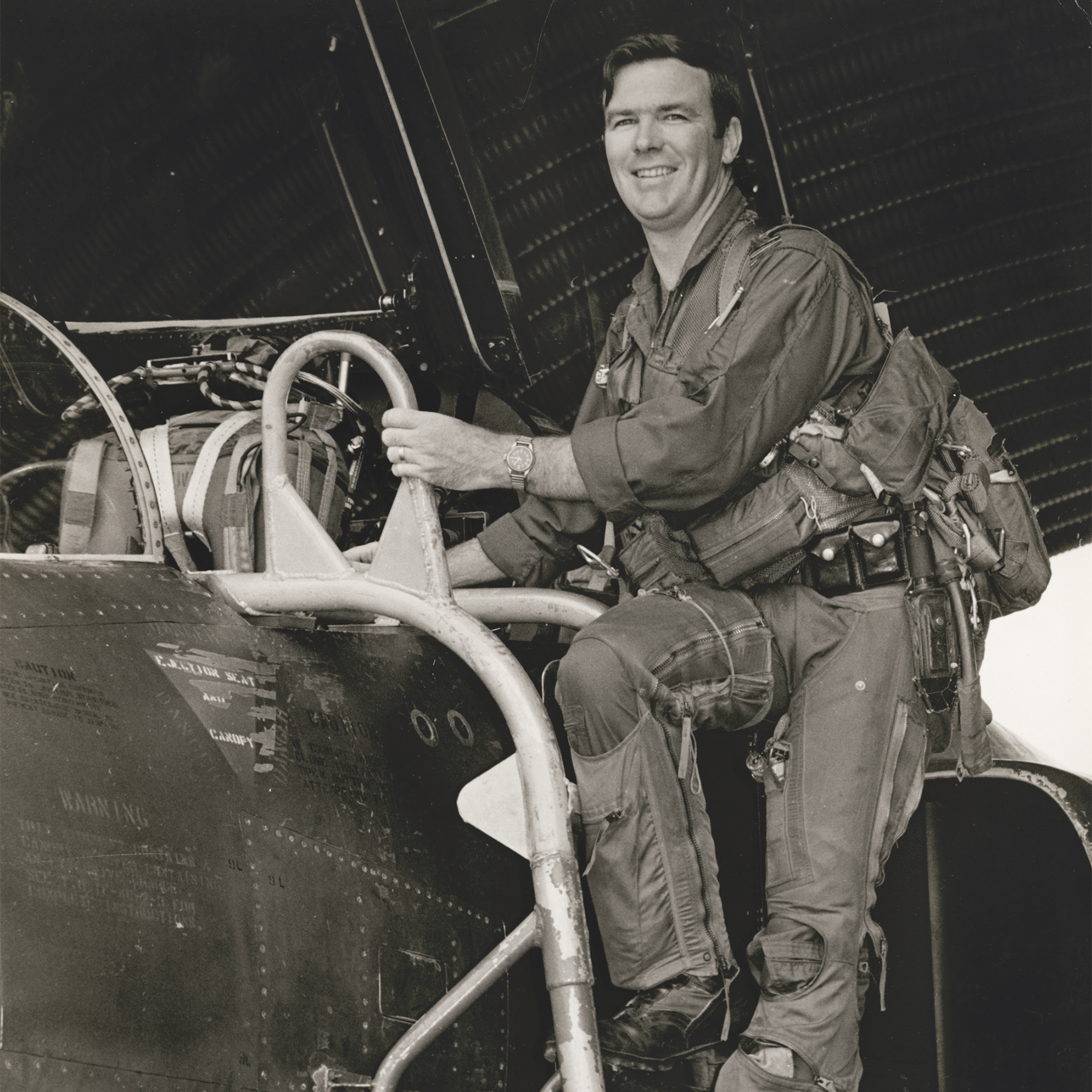 Squadron Leader Ian Whisker climbs into the cockpit of his F-4D Phantom at Phu Cat Air Base, Vietnam.