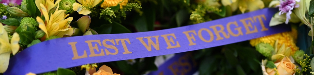 Wreaths with Lets we forget ribbons