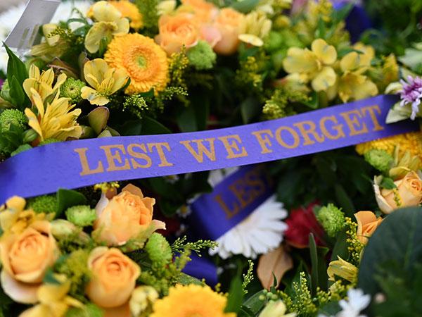 Wreaths with Lets we forget ribbons